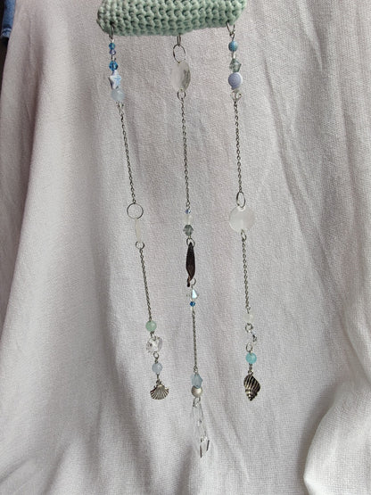 Crochet cloud suncatcher with shell