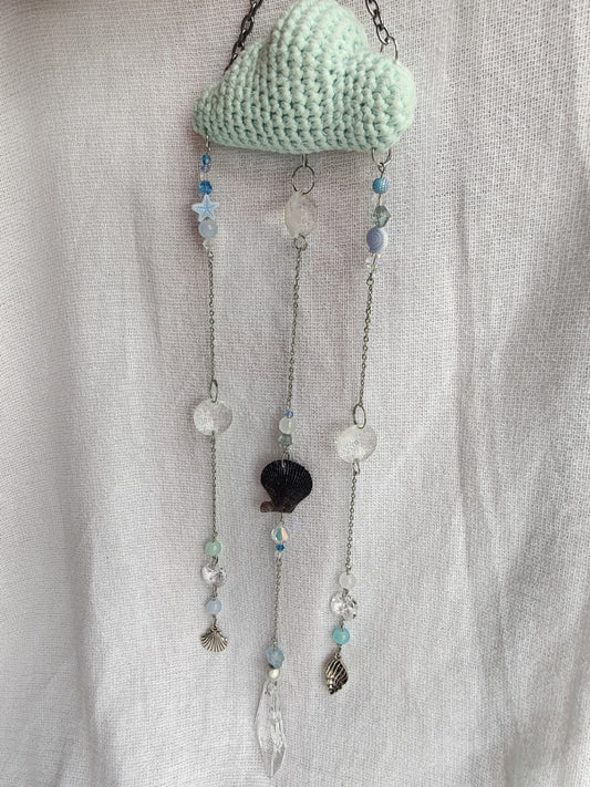 Crochet cloud suncatcher with shell