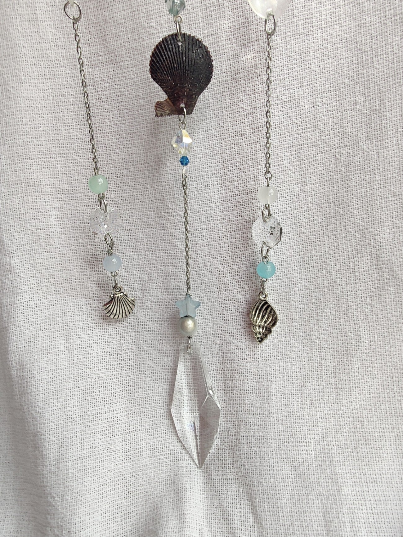 Crochet cloud suncatcher with shell