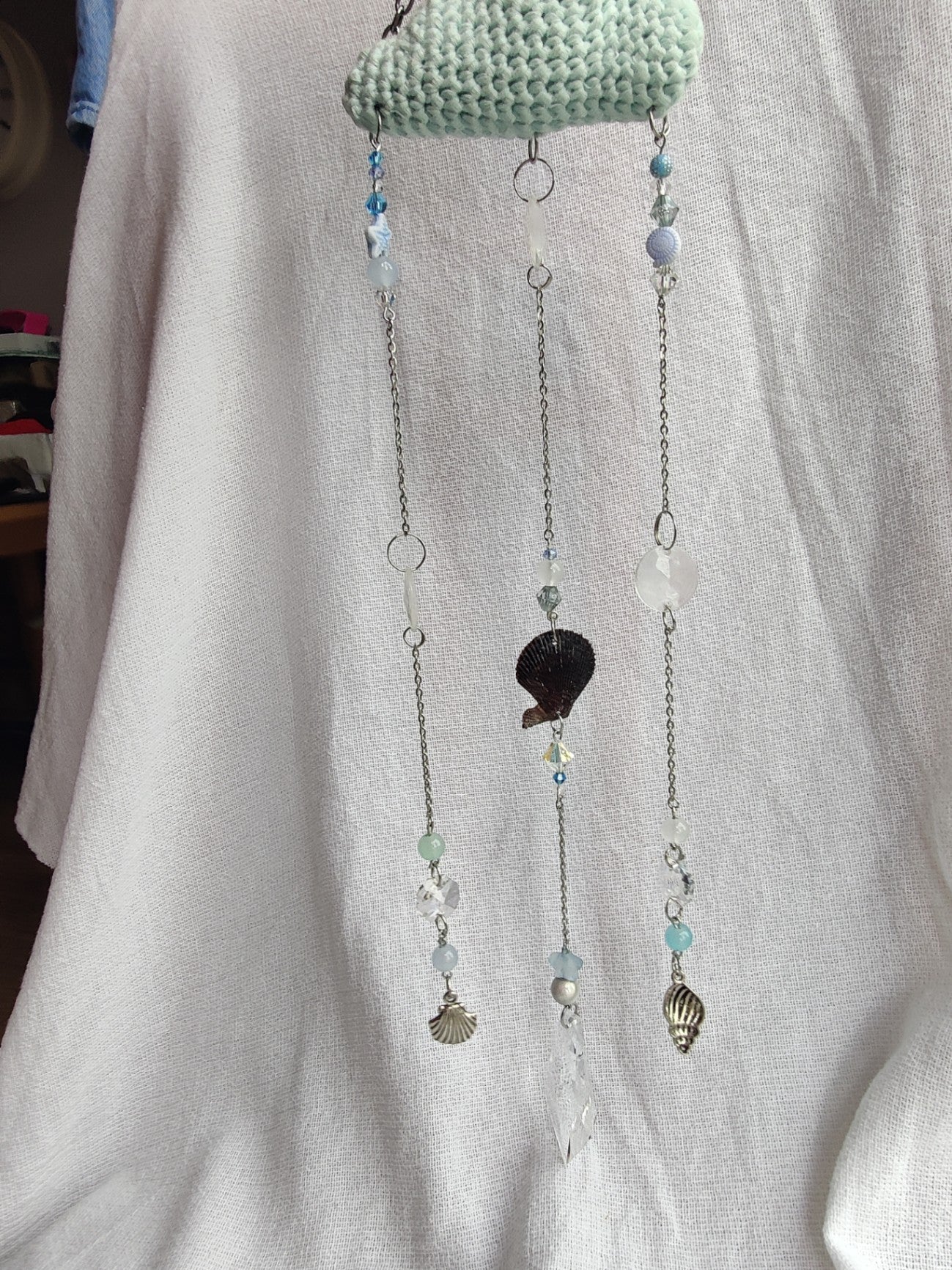 Crochet cloud suncatcher with shell