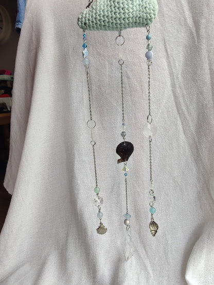 Crochet cloud suncatcher with shell