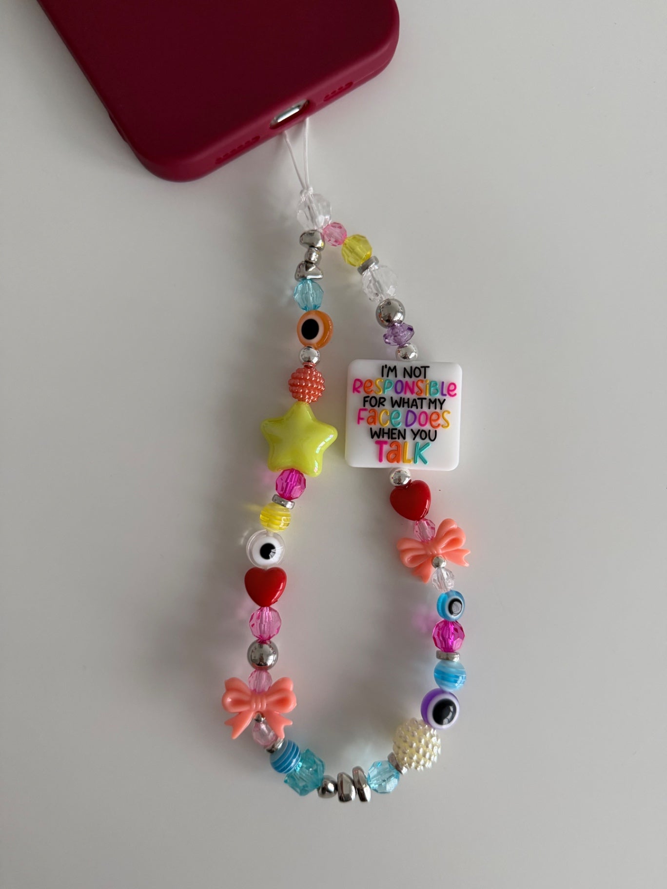 ‘Not responsible for my face’ phone charm