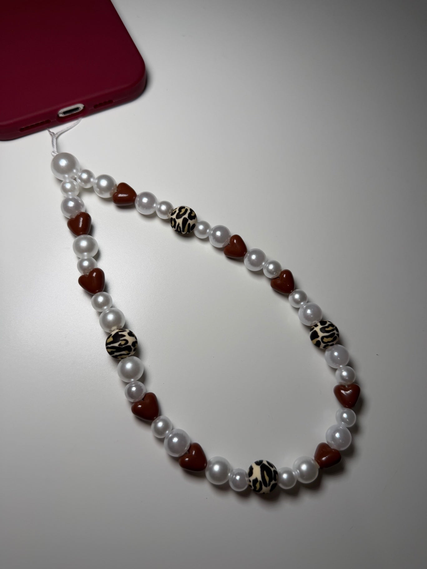 Winter leopard phone charm - brown