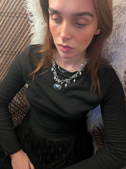 Celestial Heart Necklace — Silver Sun Amulet with Pearls & Star Charms