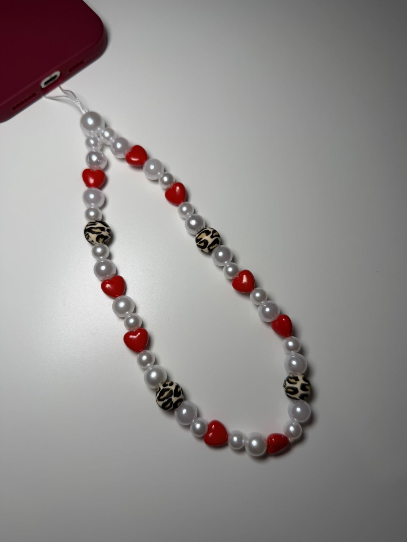 Winter leopard phone charm - red