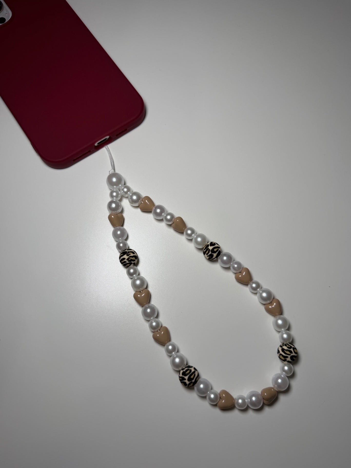 Winter leopard phone charm - beige