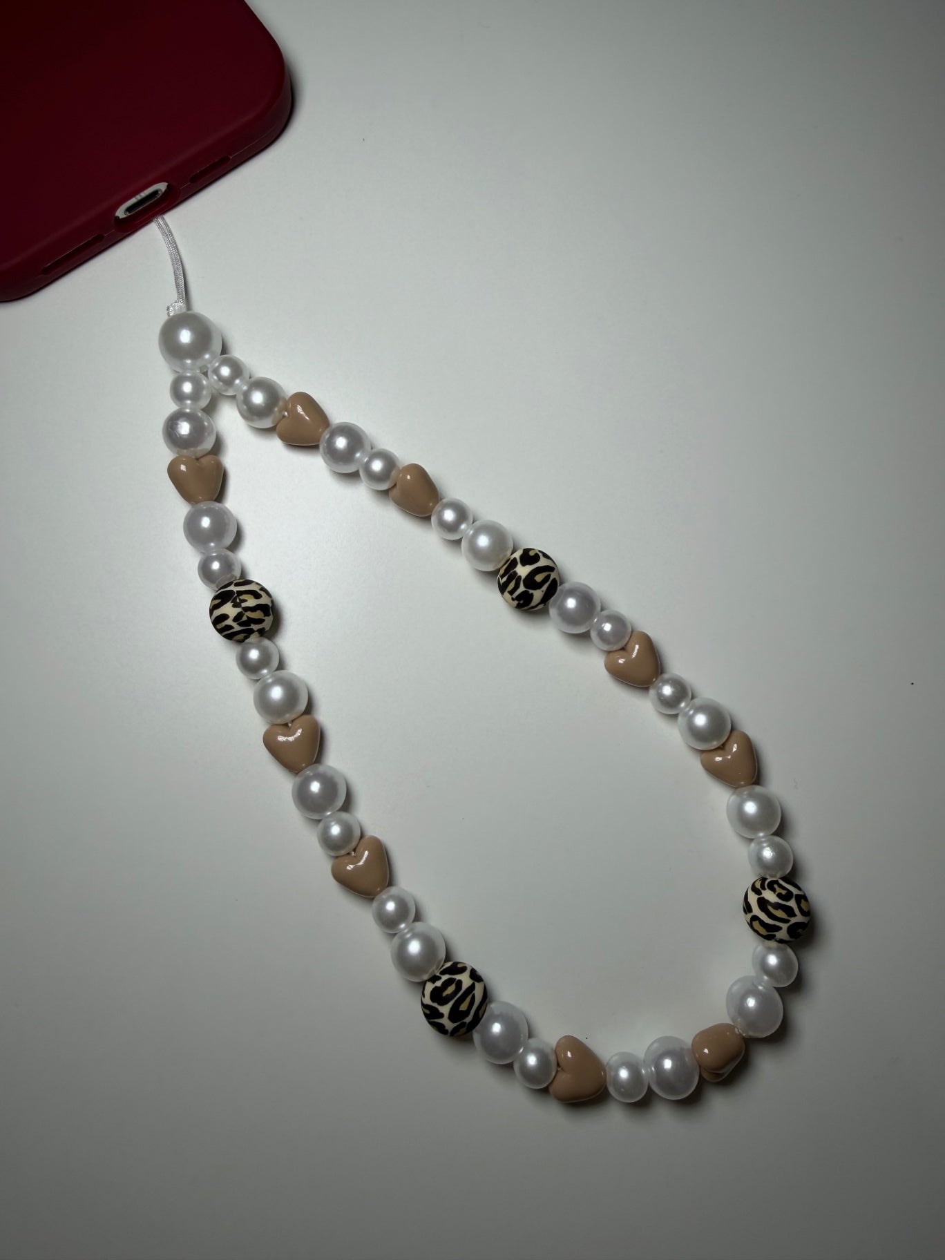 Winter leopard phone charm - beige