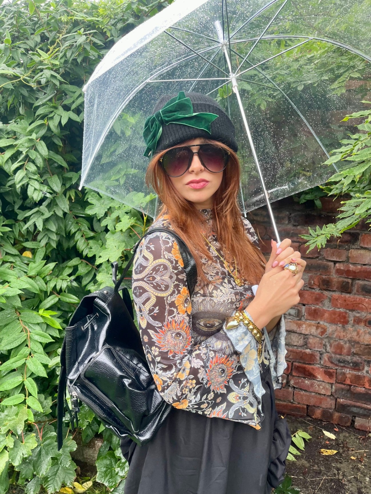 BLACK BEANIE WITH GREEN BOW