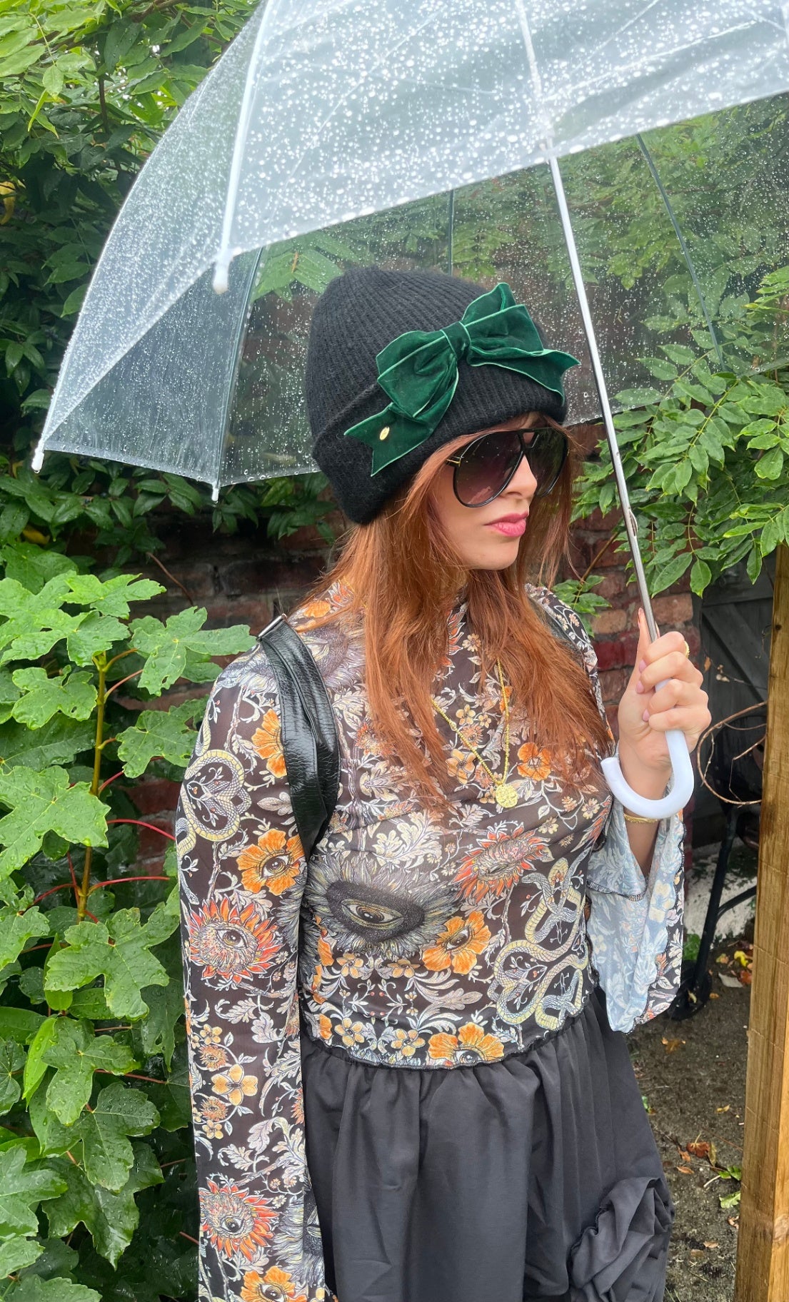 BLACK BEANIE WITH GREEN BOW