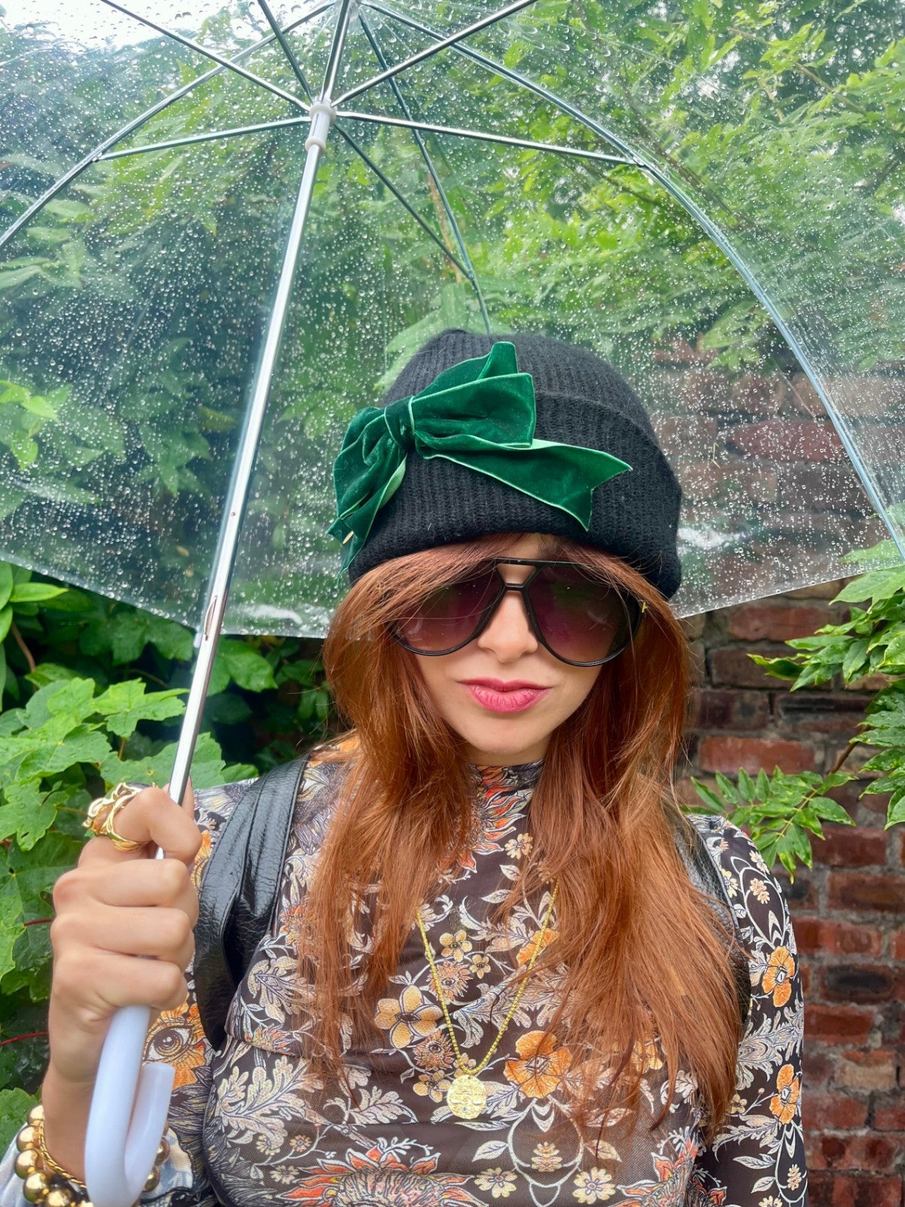 BLACK BEANIE WITH GREEN BOW