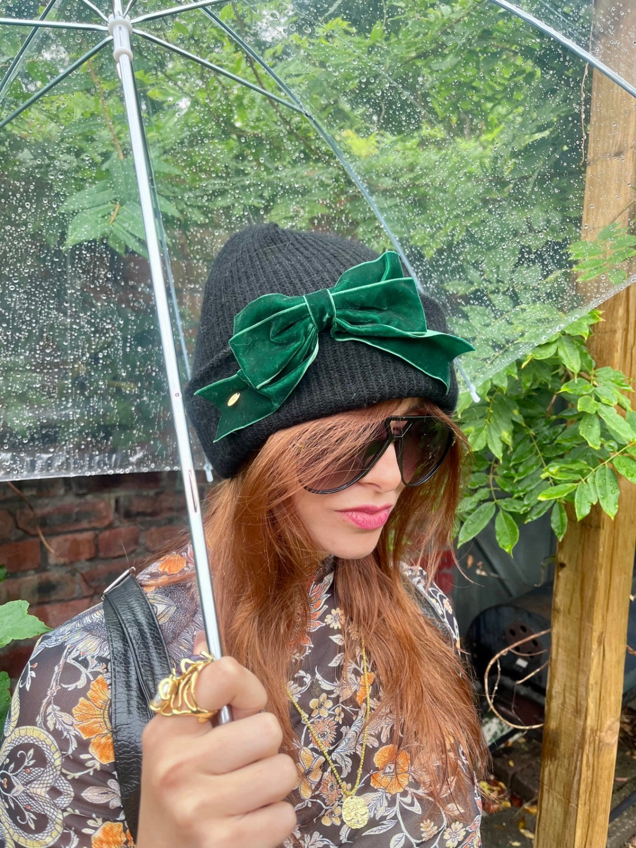 BLACK BEANIE WITH GREEN BOW