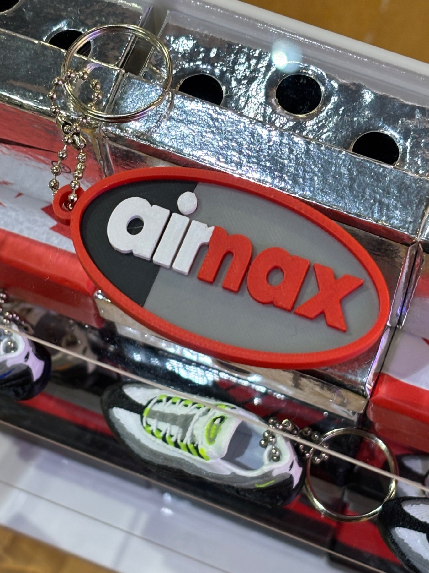 110 logo keychain red