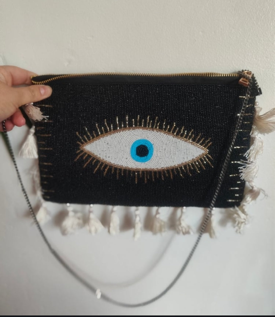 Evil eye protection bag with multi coloured headband to match