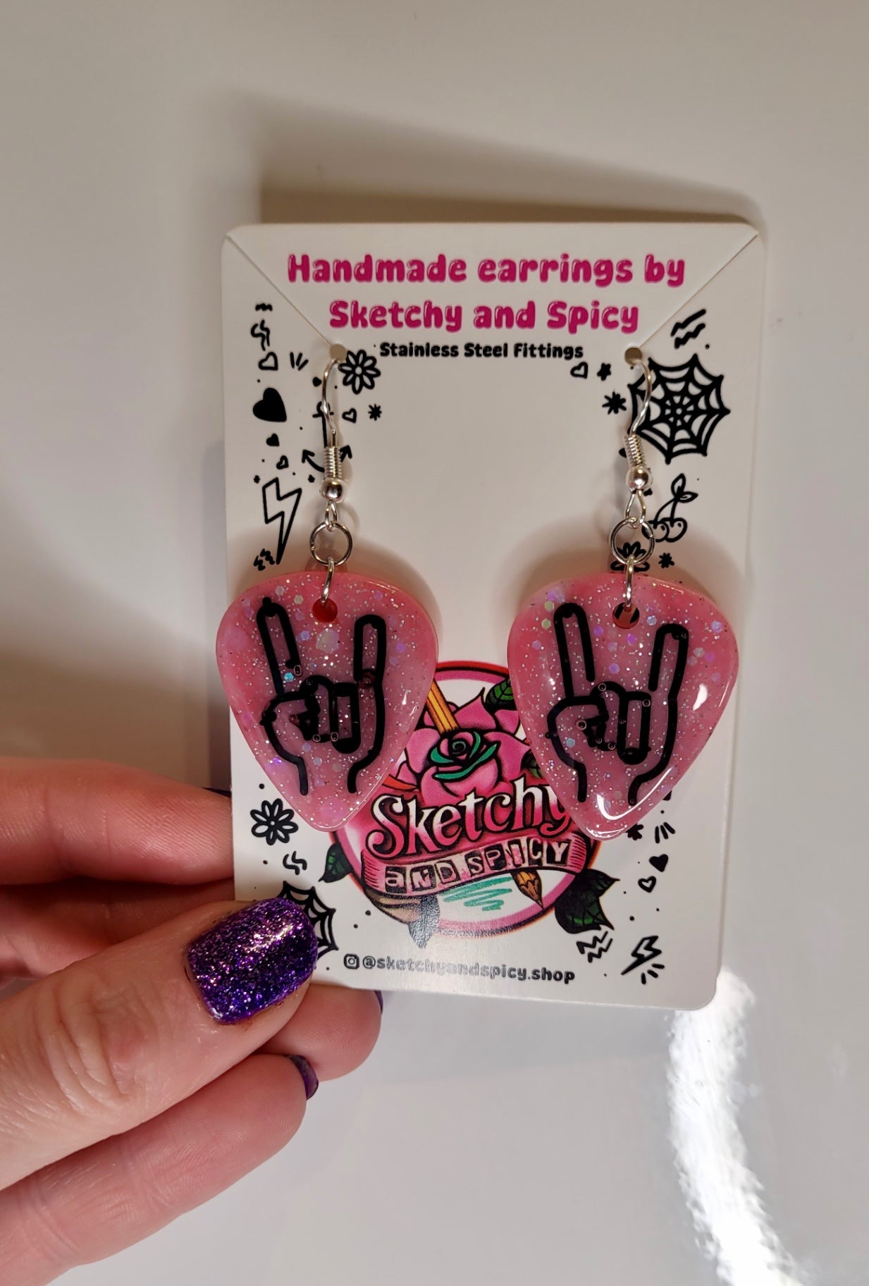 Pink Glitter Plectrum Earrings with Rock On Hand