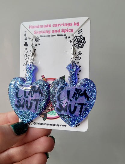 Blue Glitter Heart Paddle Cum Slut Earrings