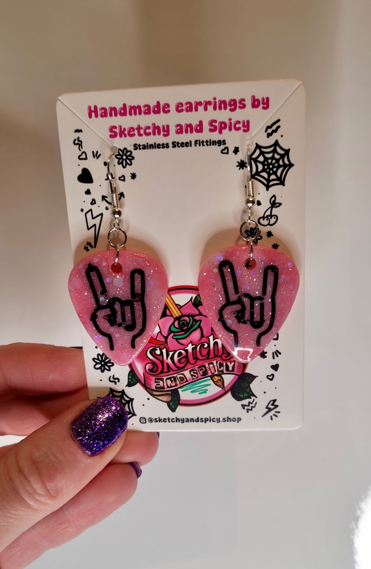 Pink Glitter Plectrum Earrings with Rock On Hand