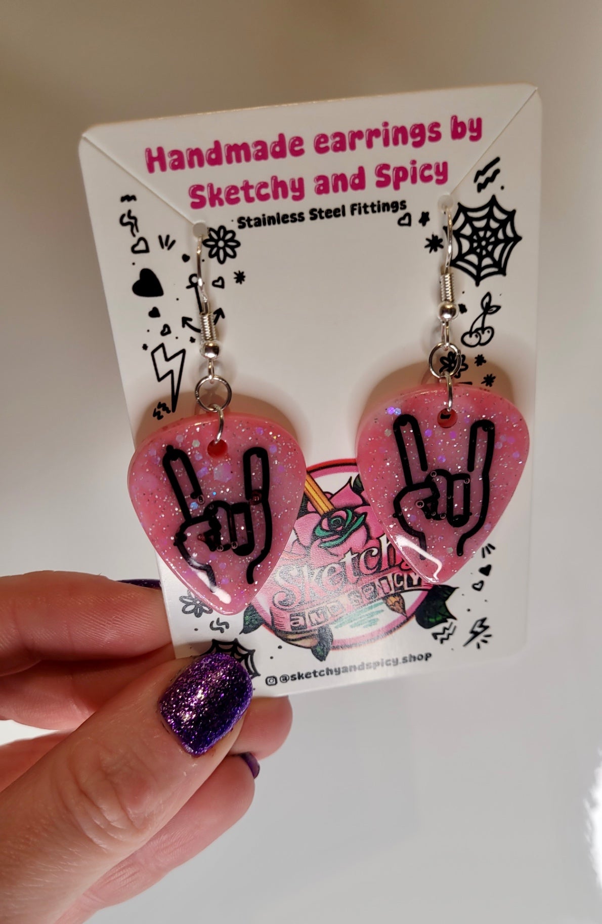 Pink Glitter Plectrum Earrings with Rock On Hand