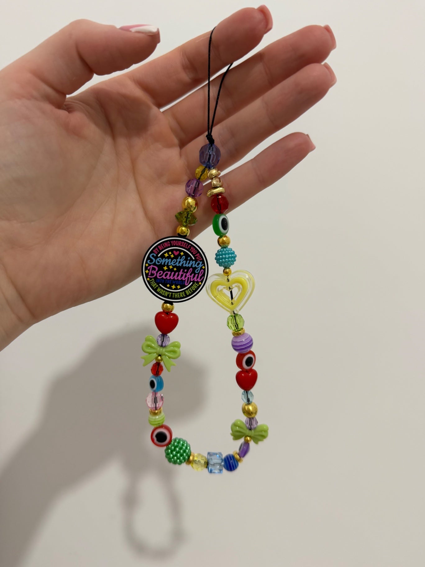 ‘Something beautiful’ phone charm - gold