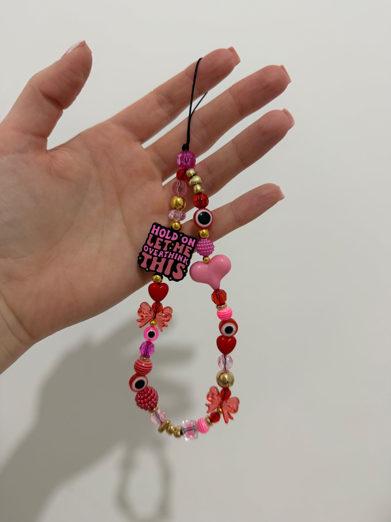 ‘Let me overthink this’ phone charm - gold