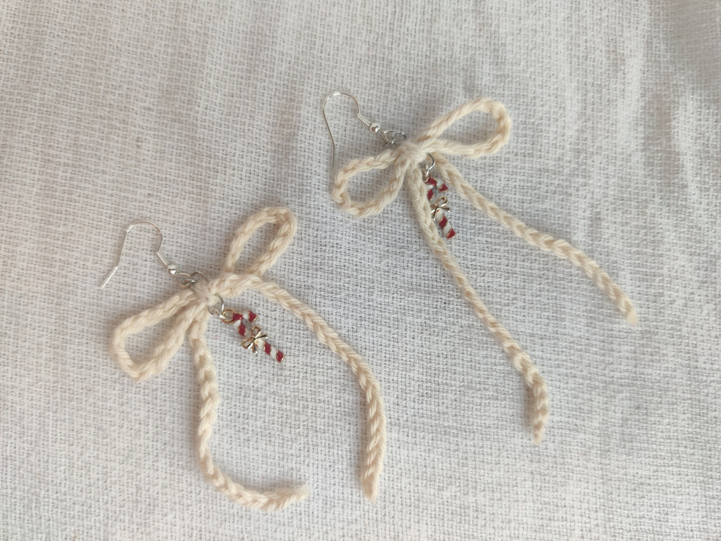 Crochet Christmas earrings, white bows, candy cane charms