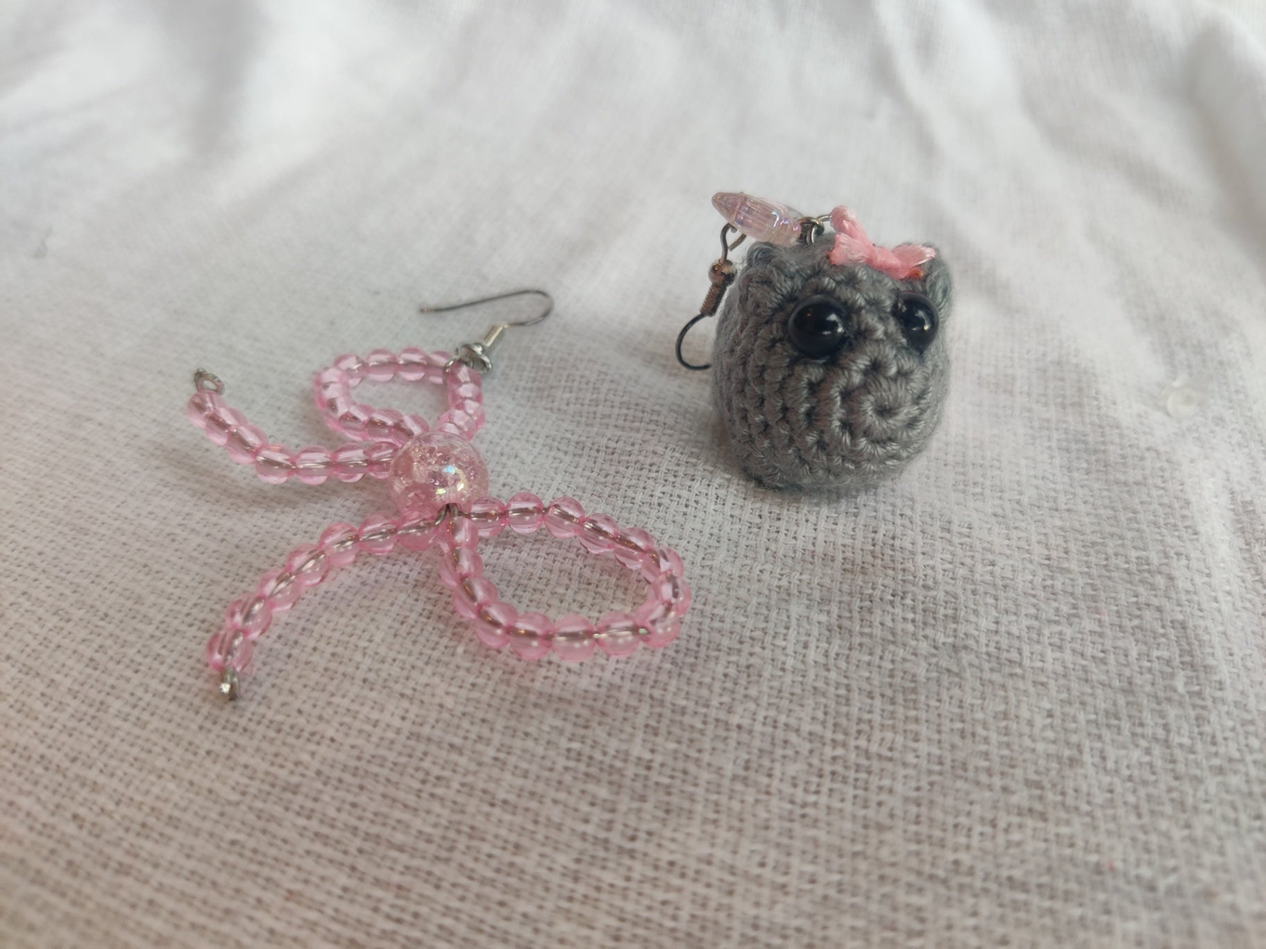 Crochet sad hamster and bow earrings