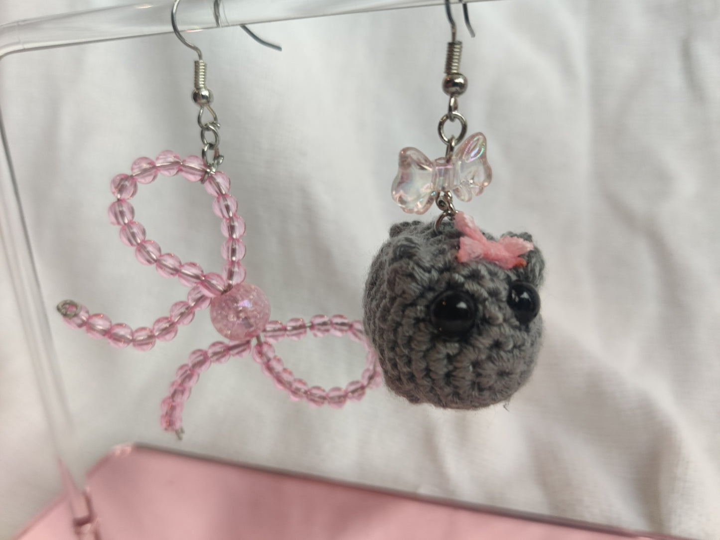 Crochet sad hamster and bow earrings