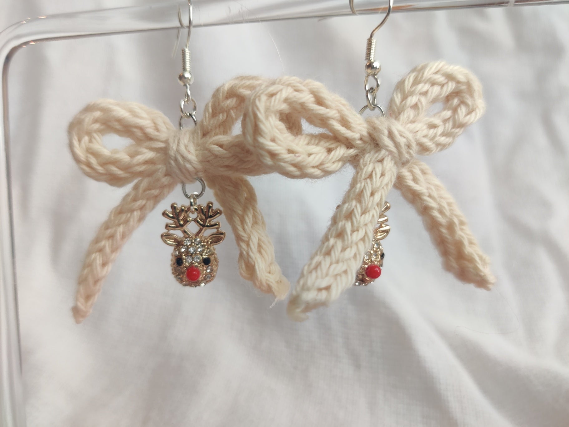 Festive crochet earrings, bows and sparkle reindeer charms
