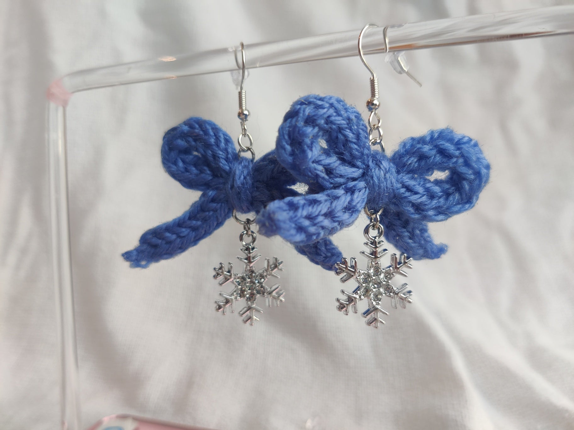 Crochet blue bow earrings with sparkle snowflake pendant