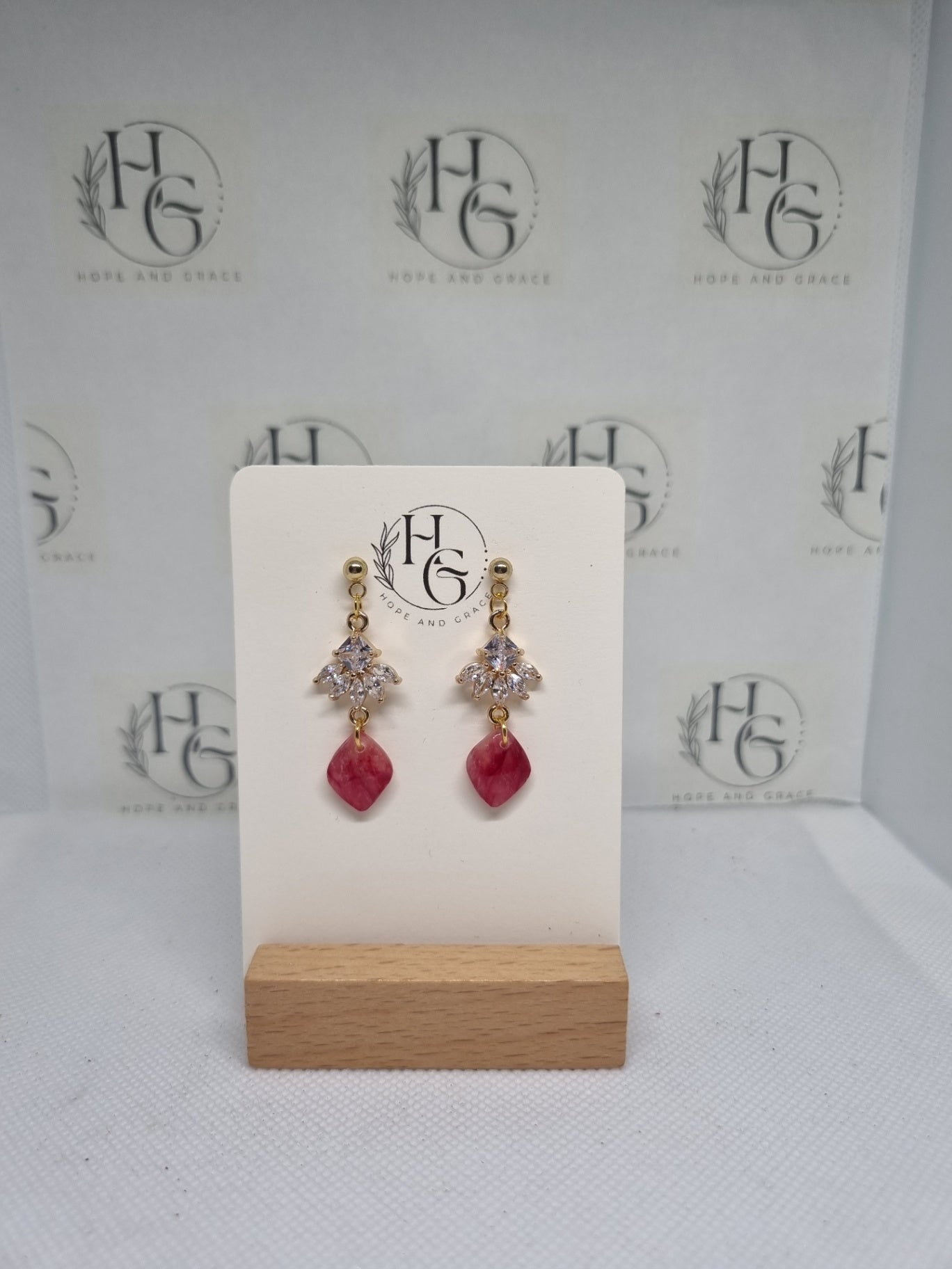 Red charm earrings