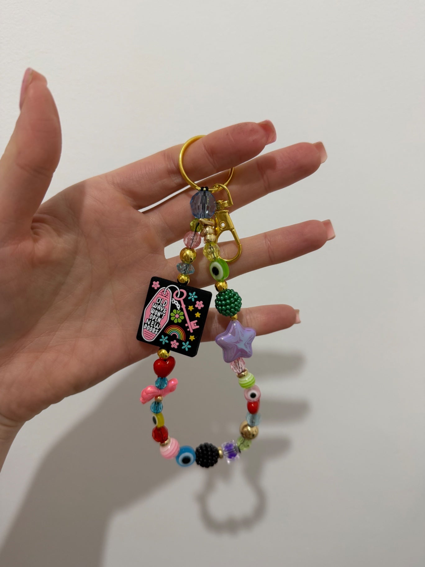‘New doors’ keyring - gold