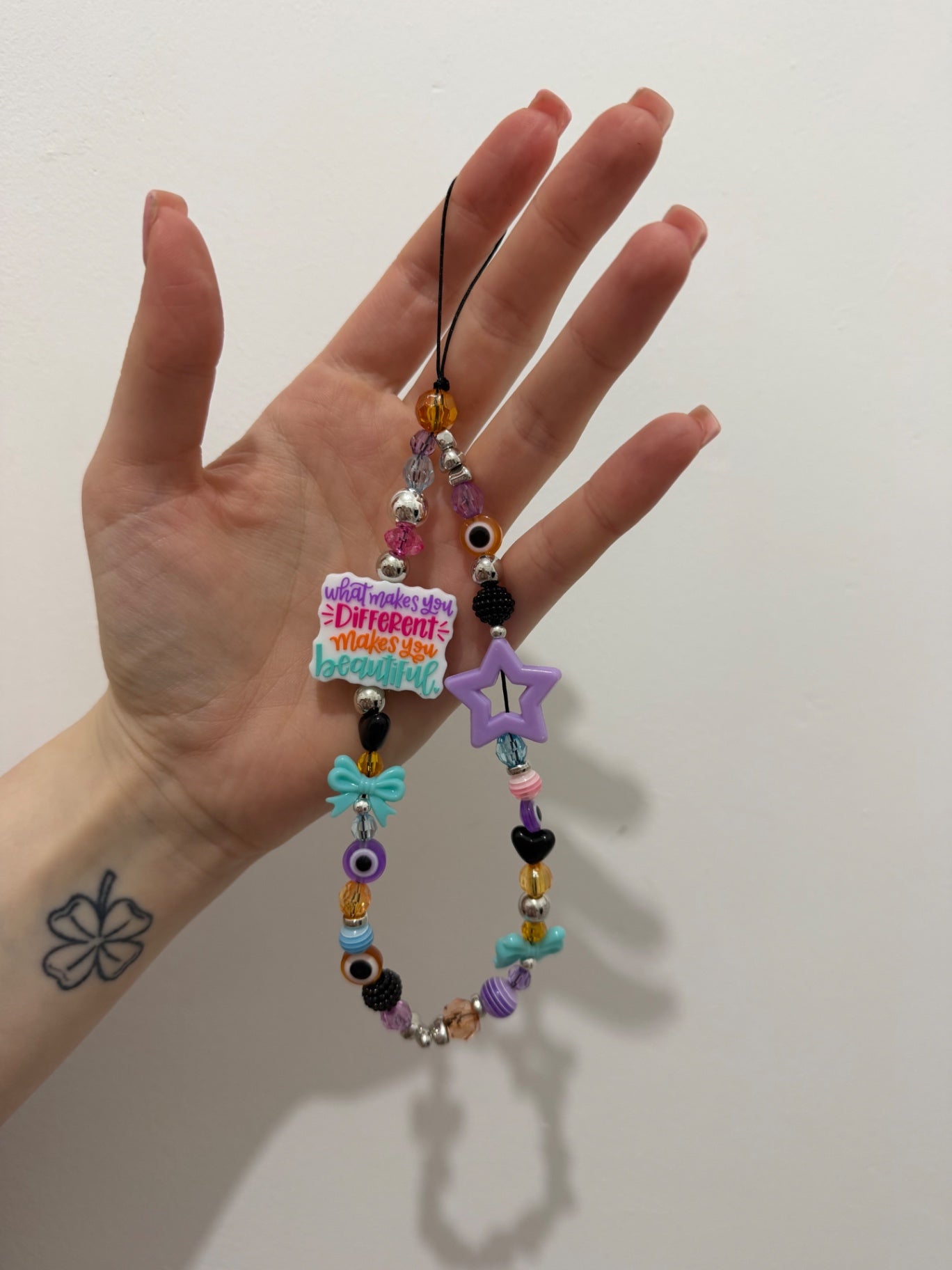 ‘Different makes you beautiful’ phone charm - silver