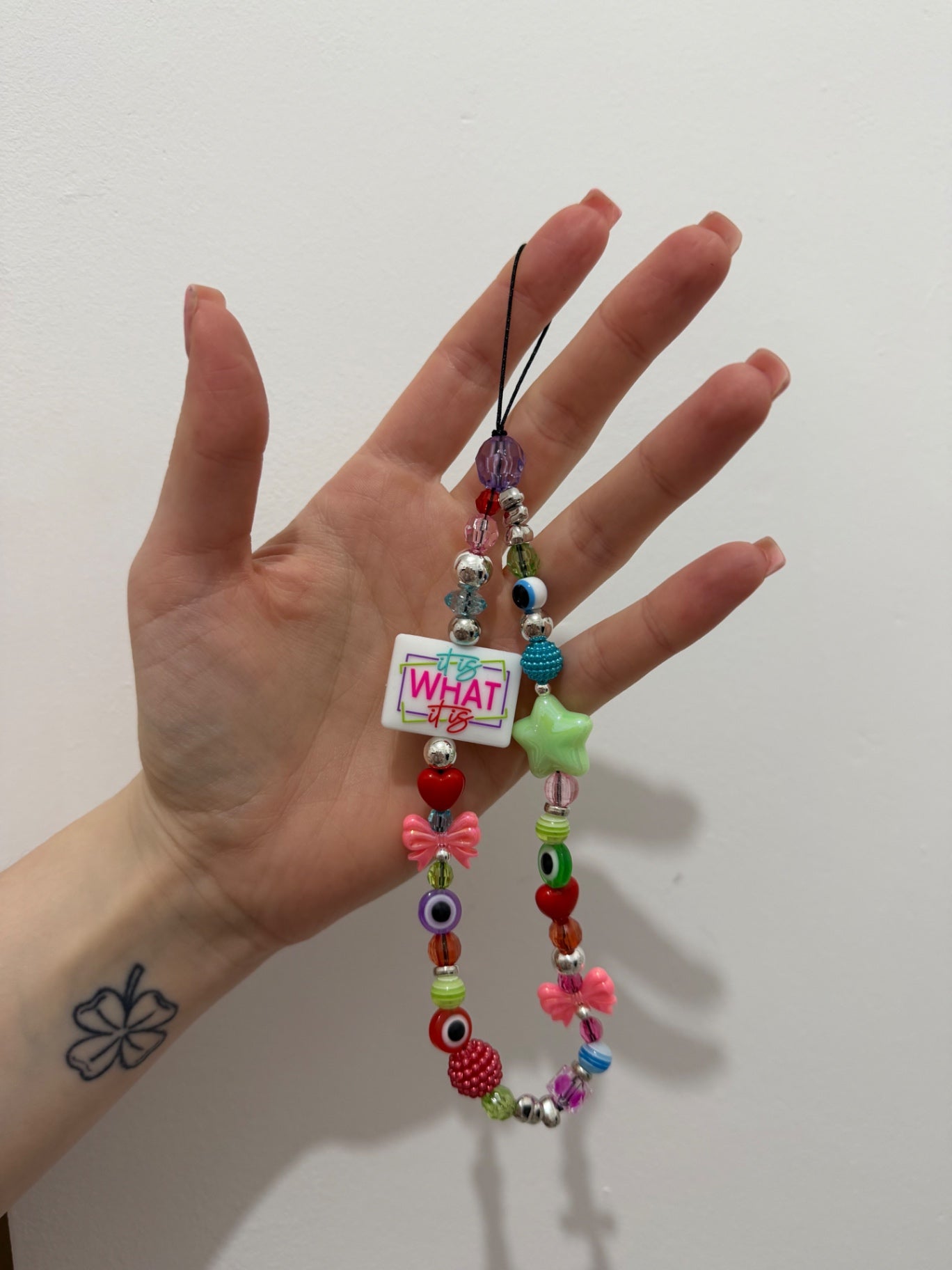 ‘It is what it is’ phone charm - silver