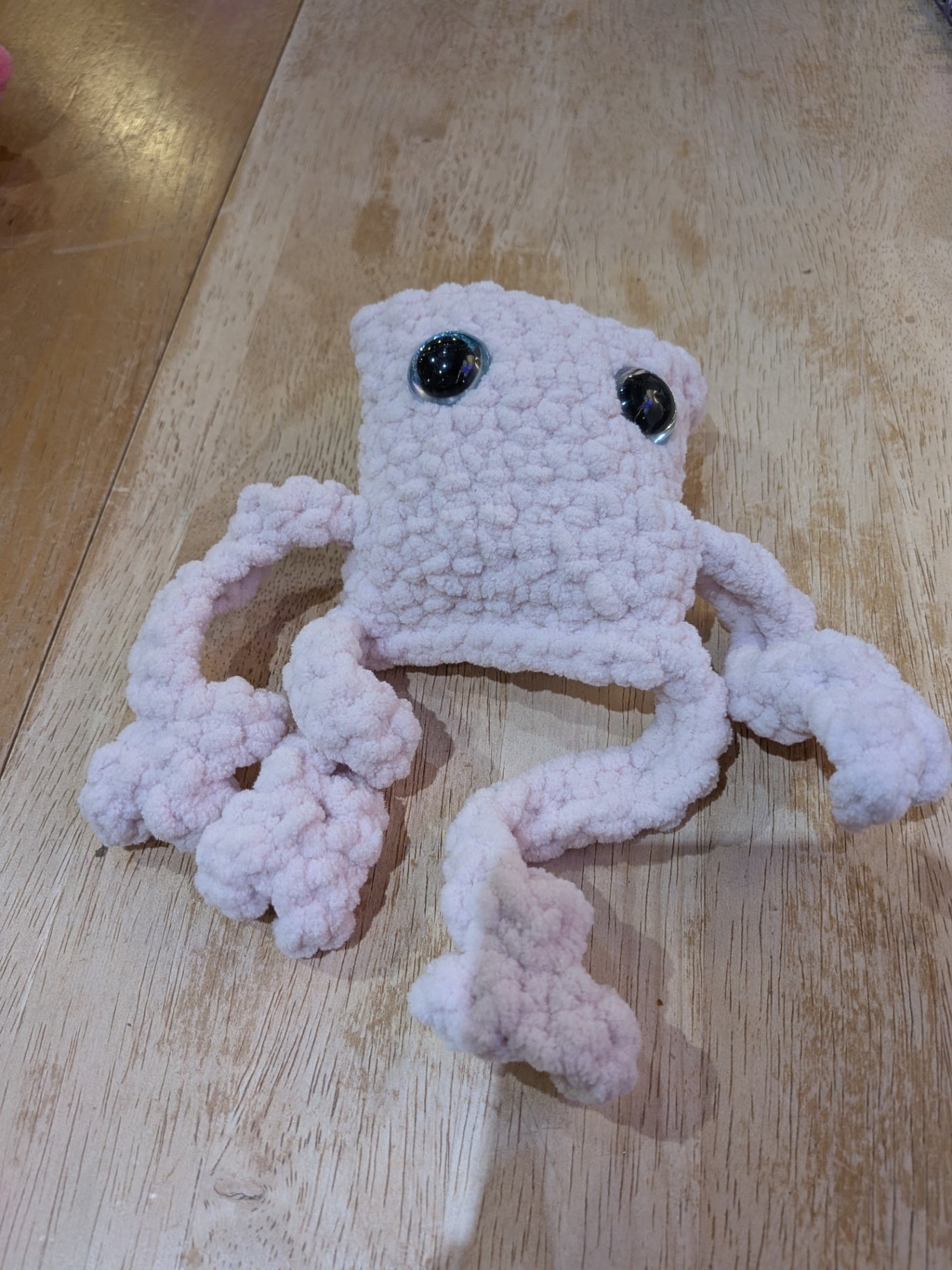 Leggy pink frog