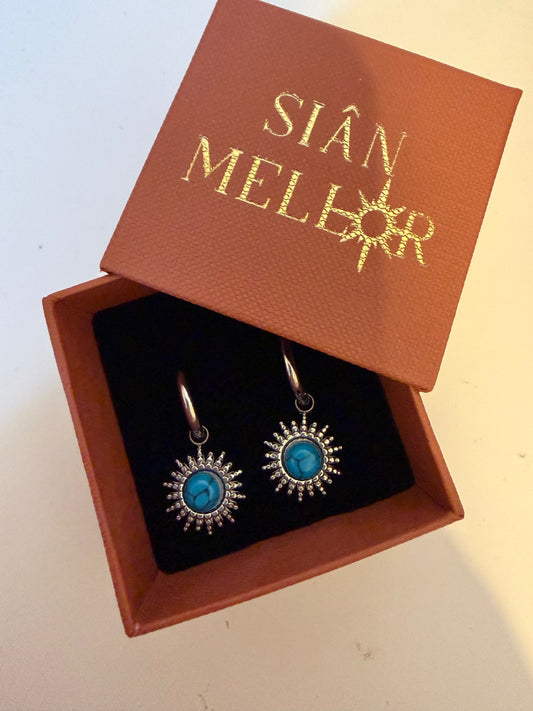 Blue and silver sun hoop earring 