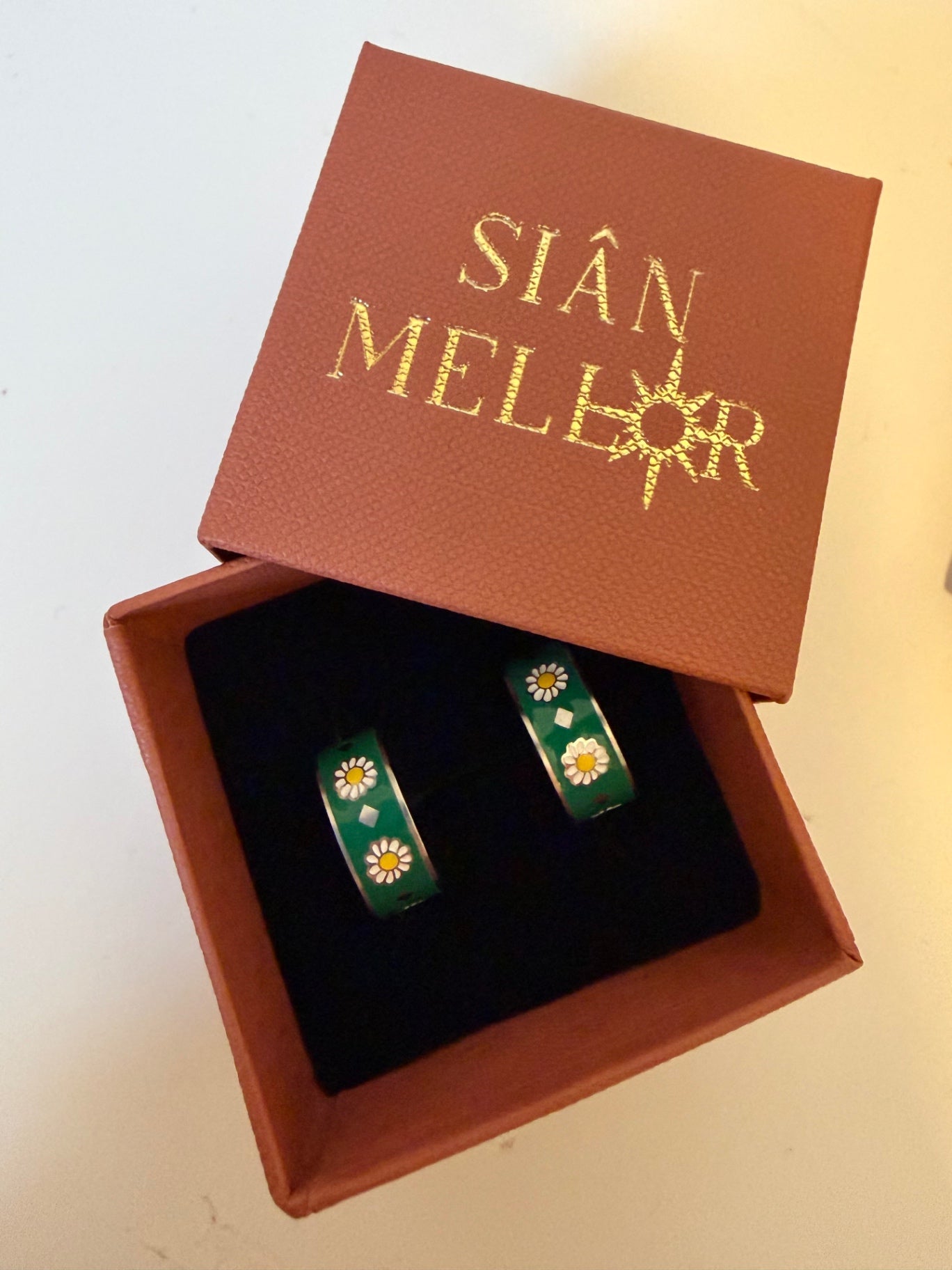 Green flower hoop earrings gold