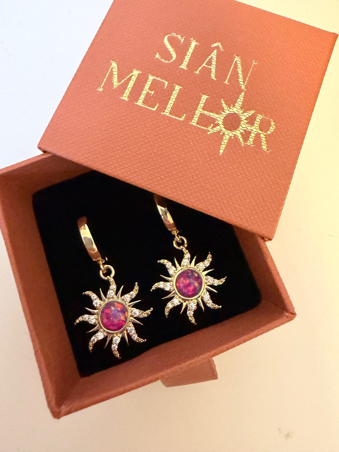 Purple and gold sun hoop earrings