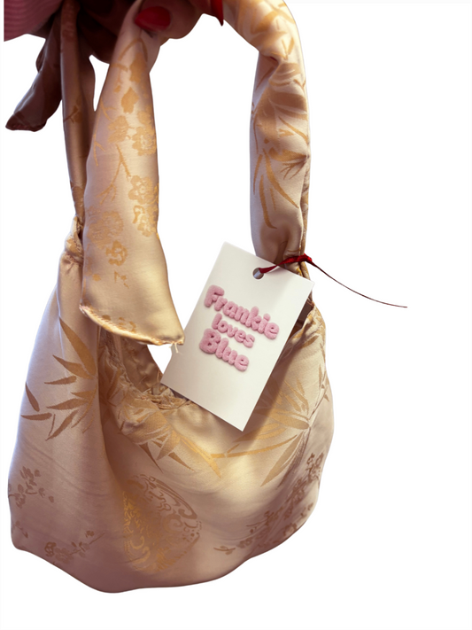 Mini satin tie handle bag 