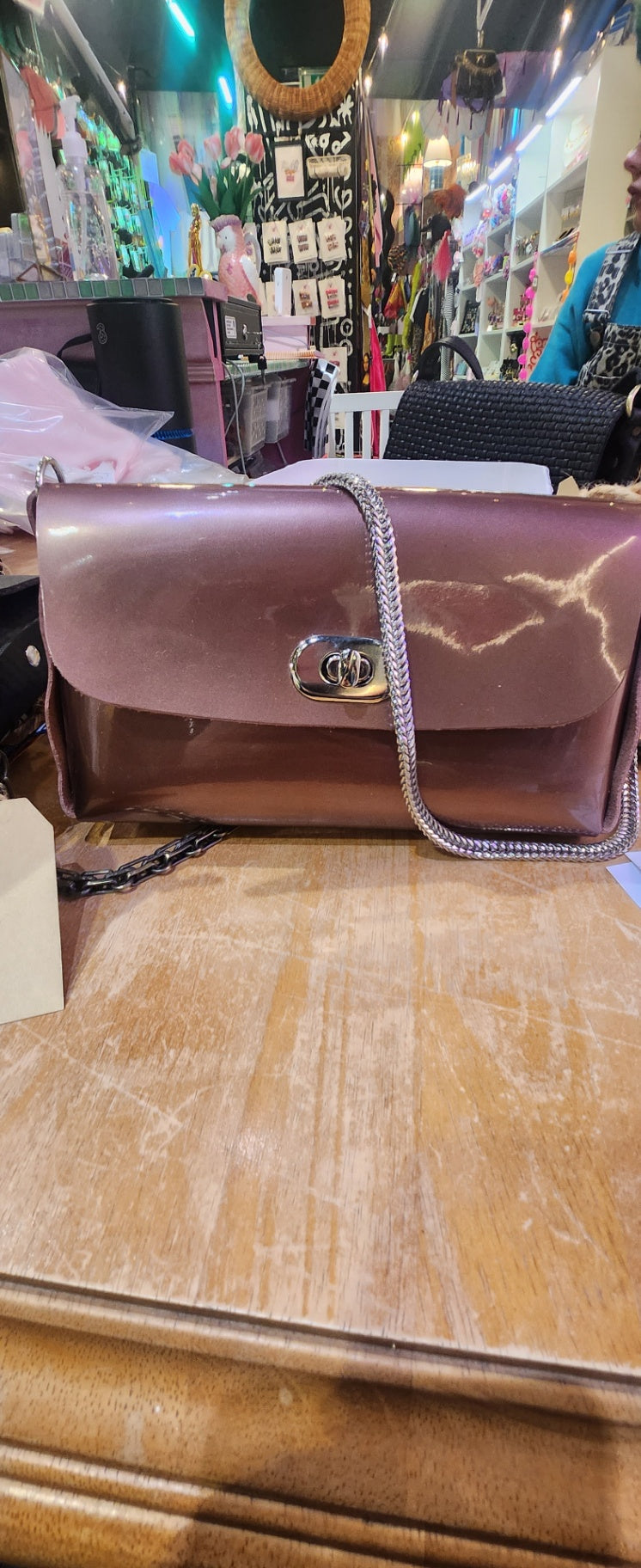 Rose gold patent leather bag