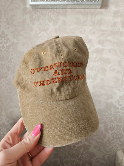Overworked and Underfucked Cross stitched cap