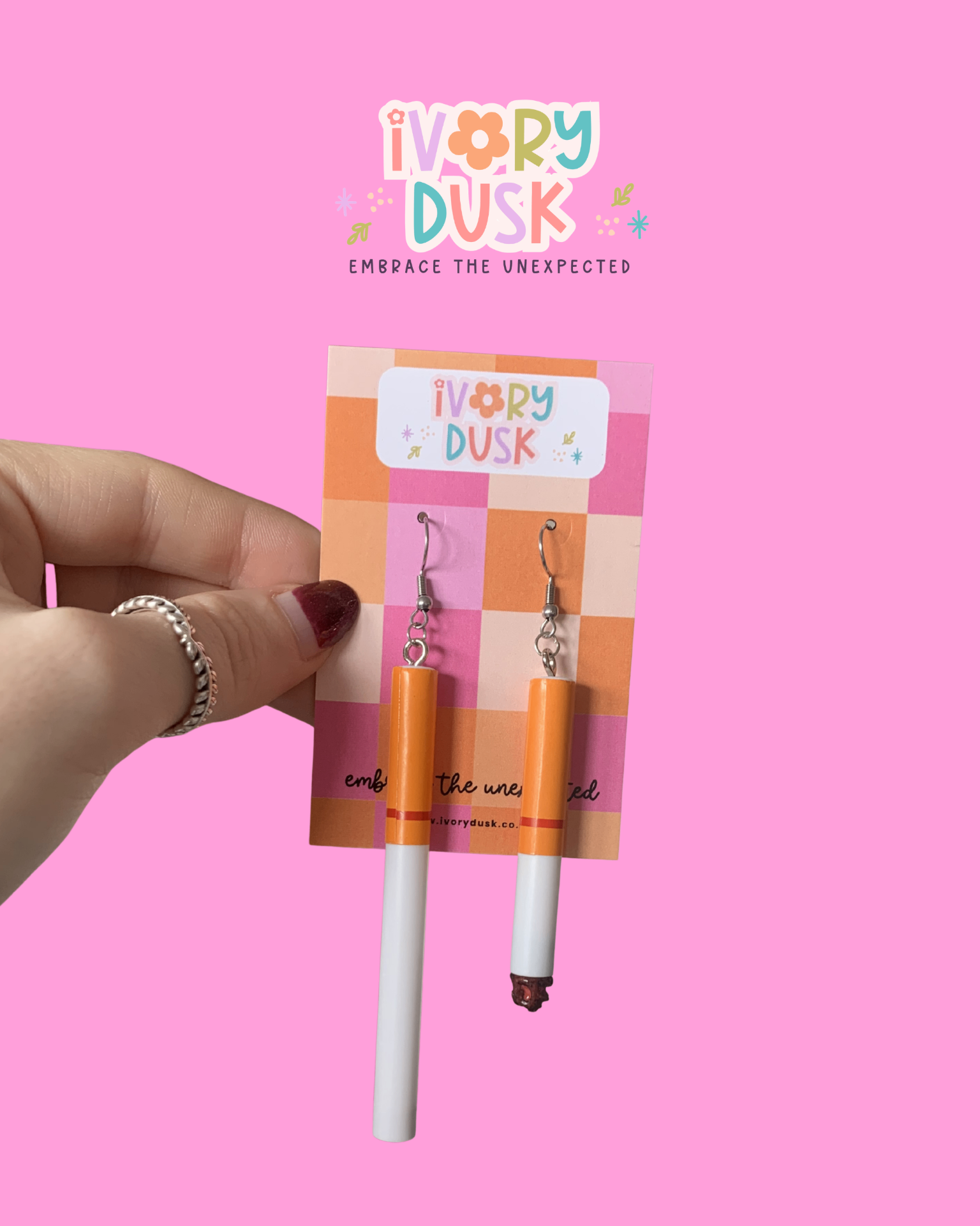 Lit cigarette earrings