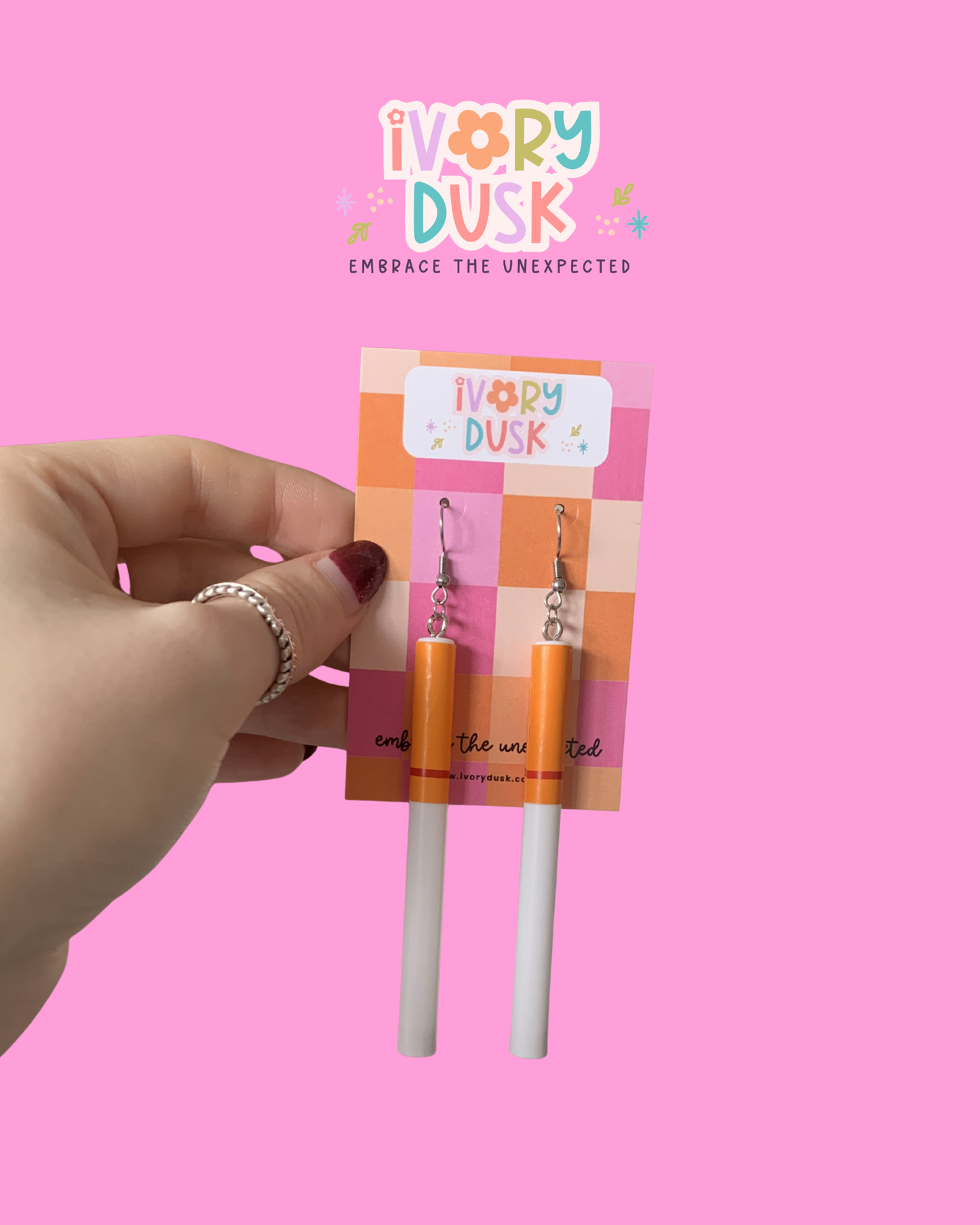 Unlit cigarette earrings