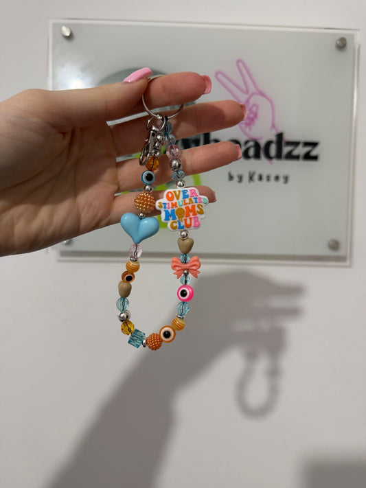 ‘Overstimulated mom’ keyring - gold
