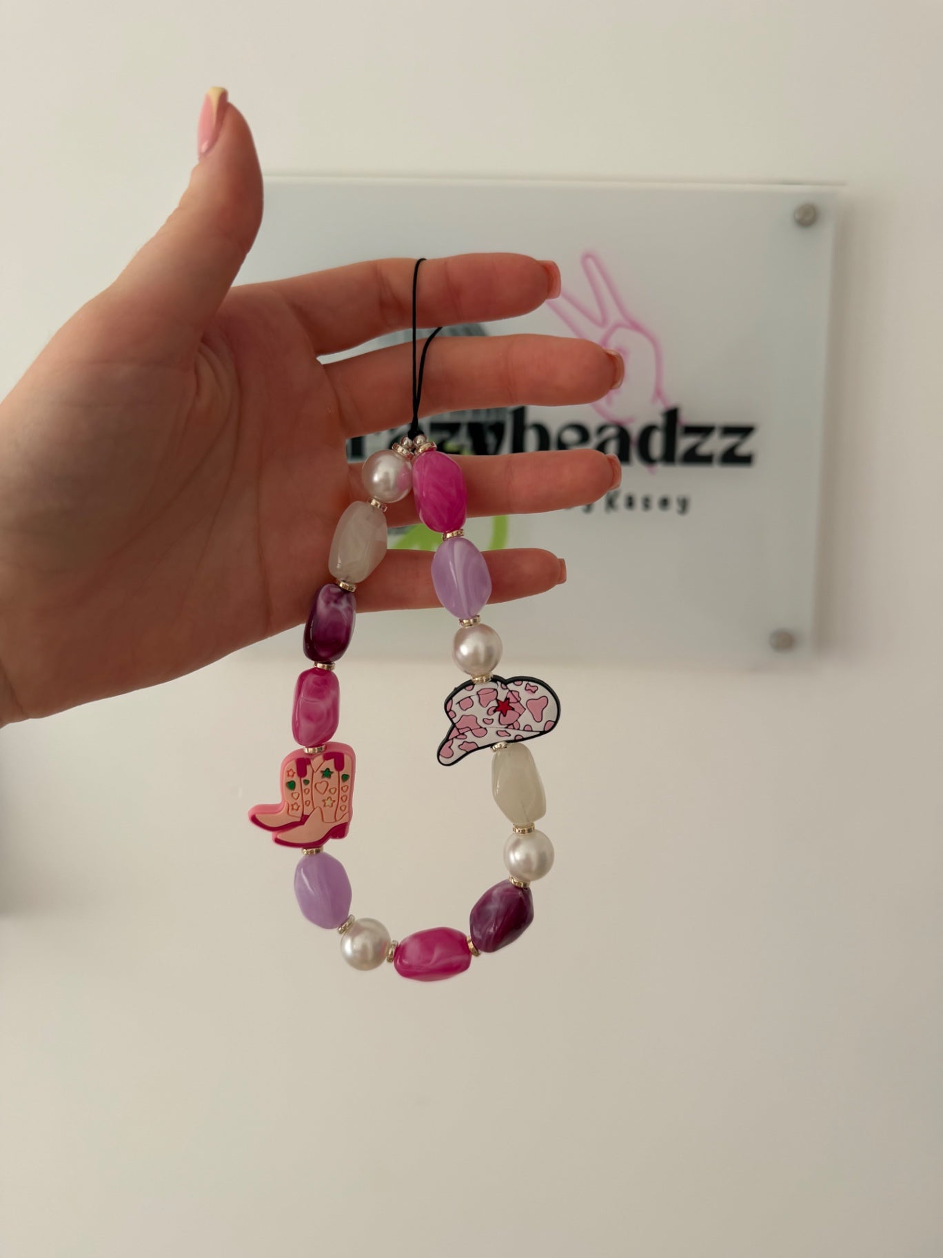 ‘Cowgirl era’ phone charm 