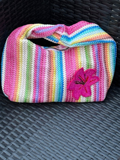 Multicoloured bag with Pink orchid patch 