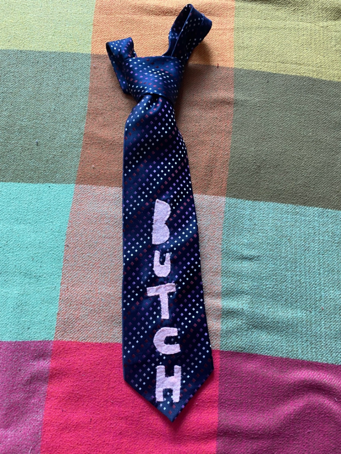 BUTCH Up-cycled tie with hand sewn design
