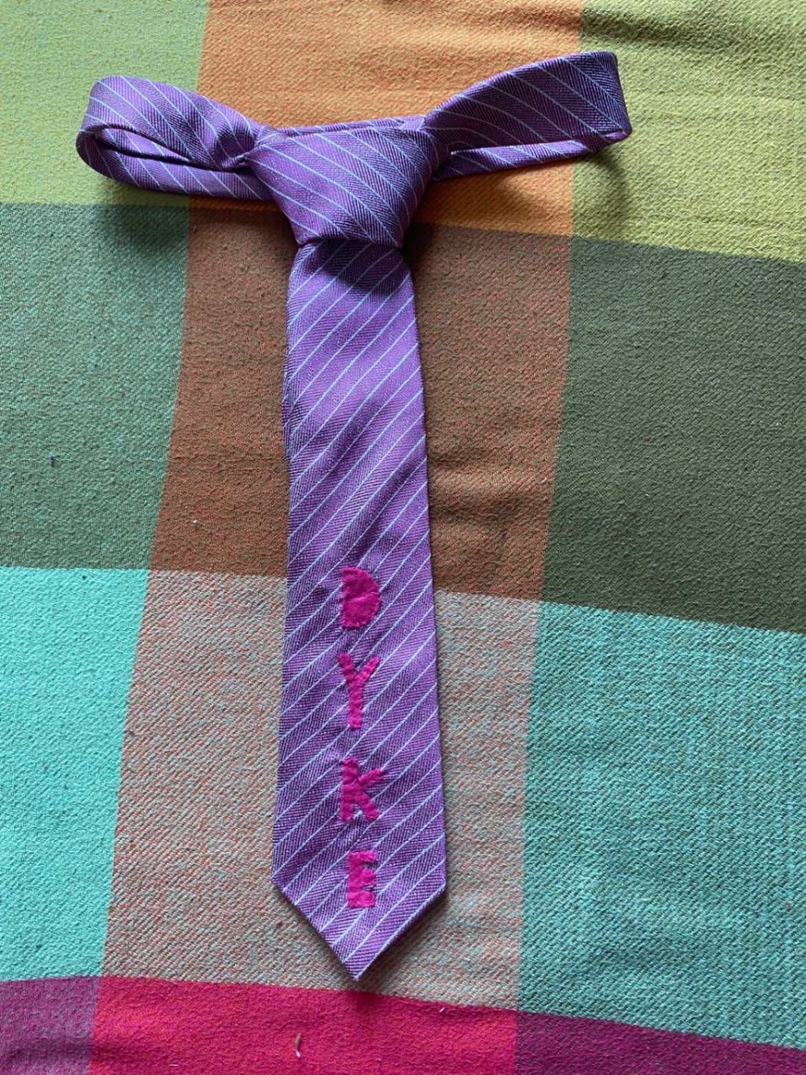 PURPLE DYKE Up-cycled tie with hand sewn design