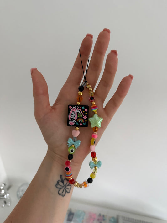 ‘Open new doors’ phone charm - gold
