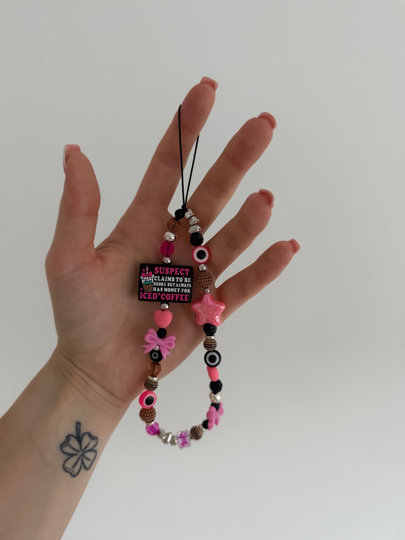 ‘Iced coffee suspect’ phone charm - silver