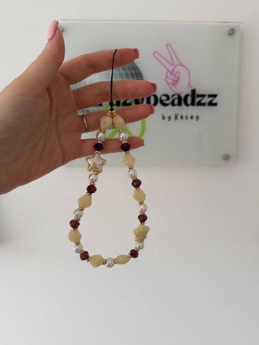 ‘Into the stars’ phone charm - yellow/brown