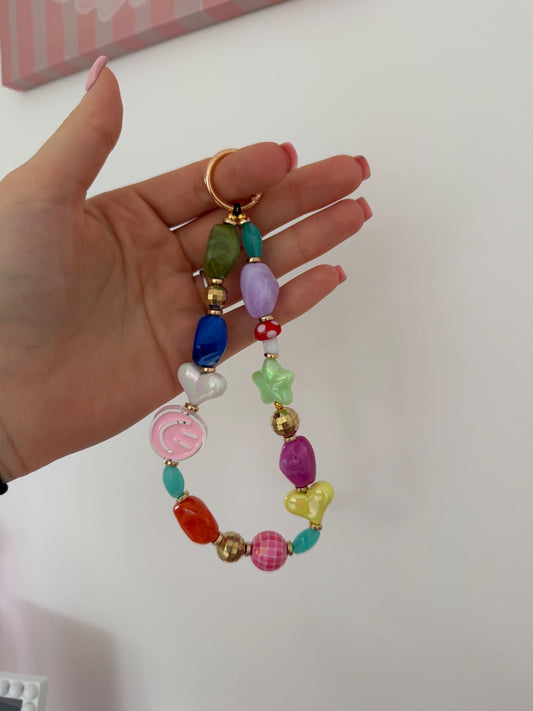 ‘Good vibes only’ phone charm - gold